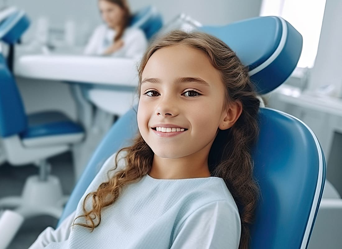 Employee Benefits - Young Girl Smiling After a Dental Appointment